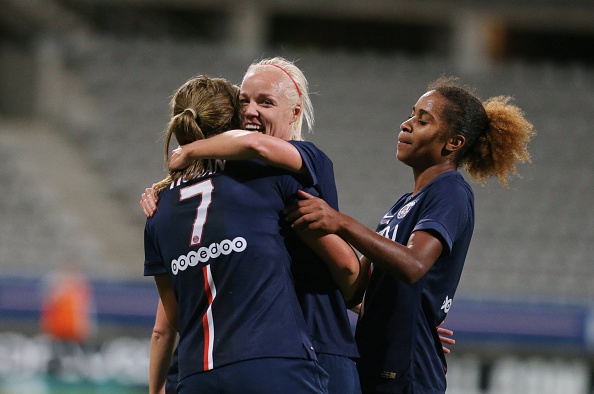 PARIS, FRANCE - OCTOBER 04:  Lindsey Horan of Paris Saint-Germain celebrates his goal with Caroline Seger during the Women Division 1 between Paris Saint-Germain FC and FCF Juvisy Essonne at Charlety on october 4, 2014 in Paris, France.  (Photo by Xavier Laine/Bongarts/Getty Images)